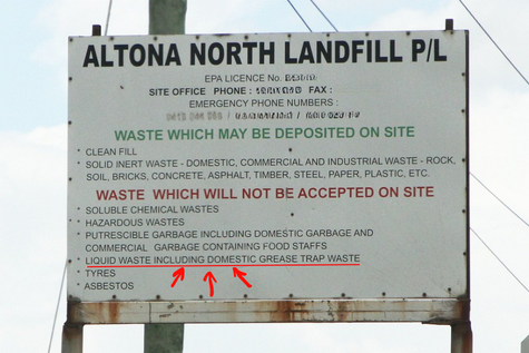 Landfill entrance sign listing wastes that will not be accepted on site, including grease trap waste — highlighting misleading waste diversion reporting practices.